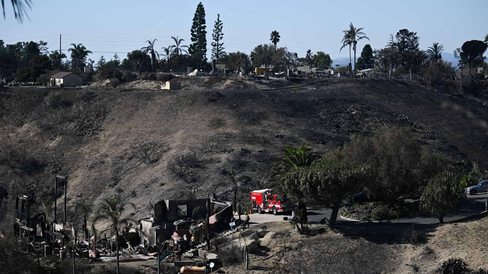 Image for the title: California wildfire claims more than 130 houses  