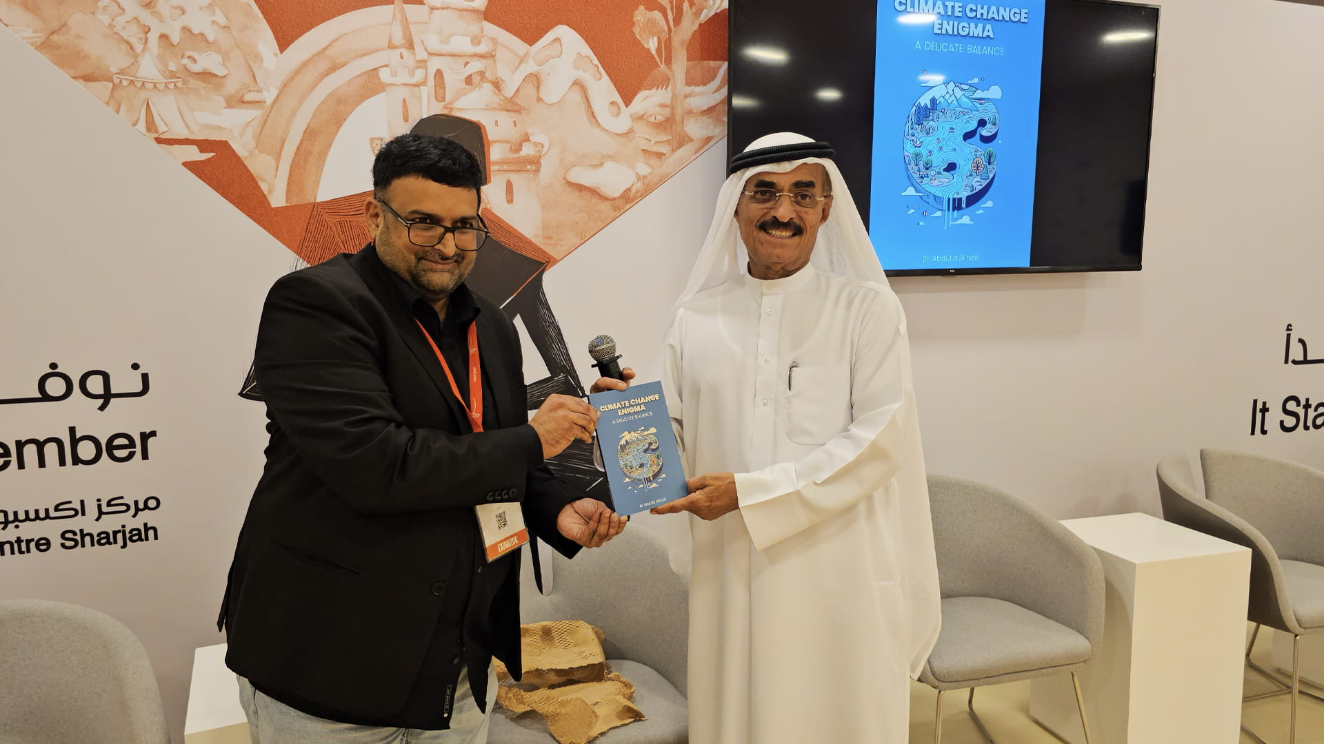 Image for the title: Dr. Abdullah Belhaif signs his new book at SIBF 