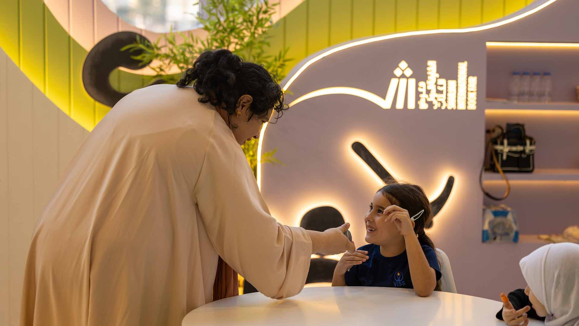 Image for the title: Children give their favourite comic characters a voice at SIBF 