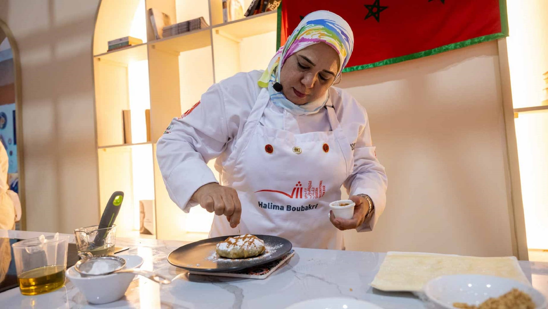 Image for the title: Moroccan culinary heritage shines at SIBF with Chef Halima 