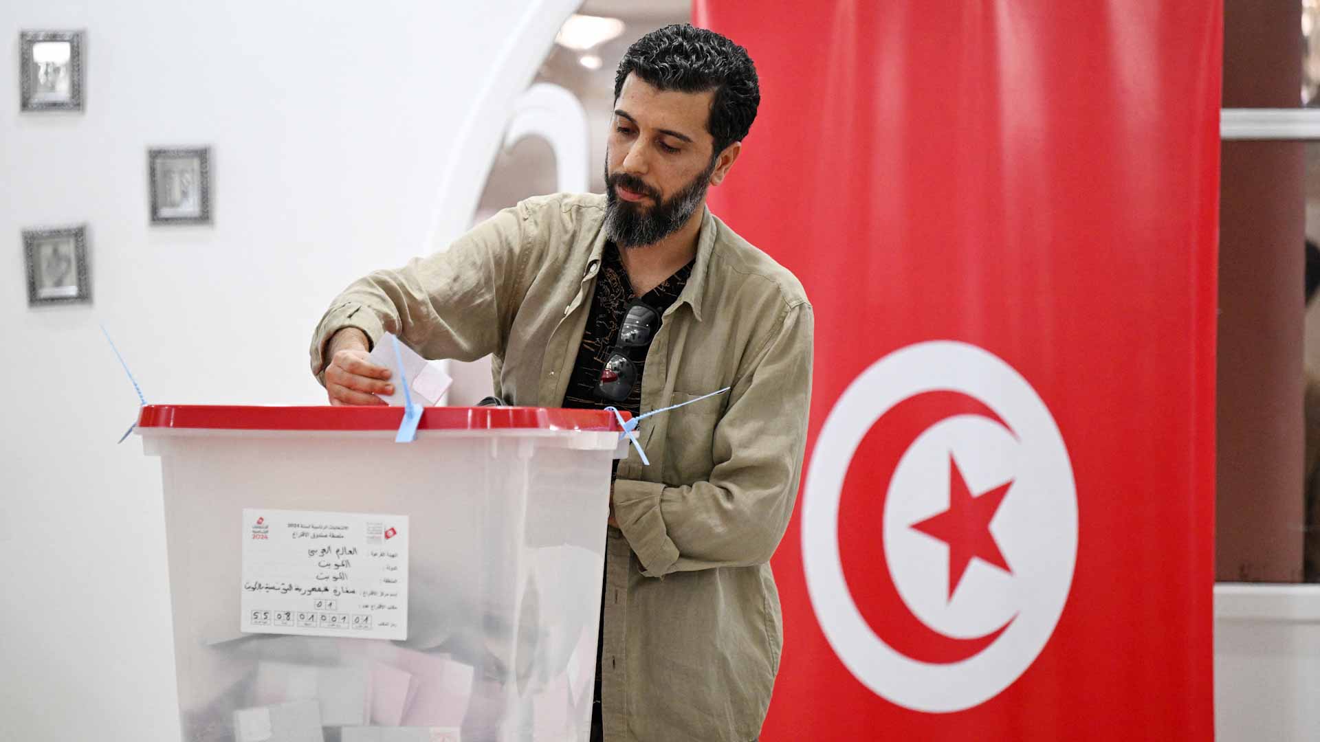 Image for the title: Tunisia incumbent Saied set to win presidential vote: exit polls 