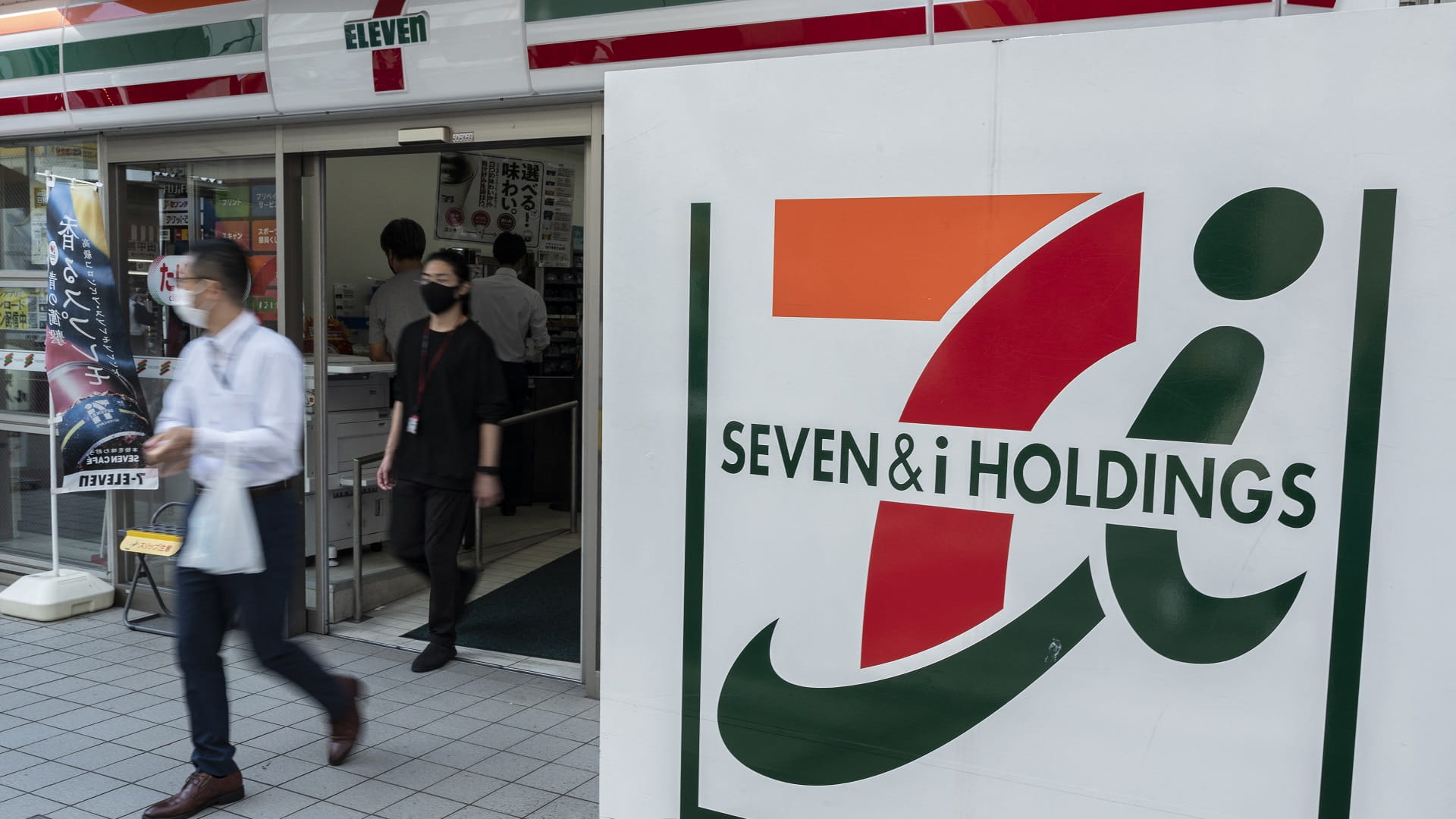 Fighting takeover, 7-Eleven owner focuses on core unit 