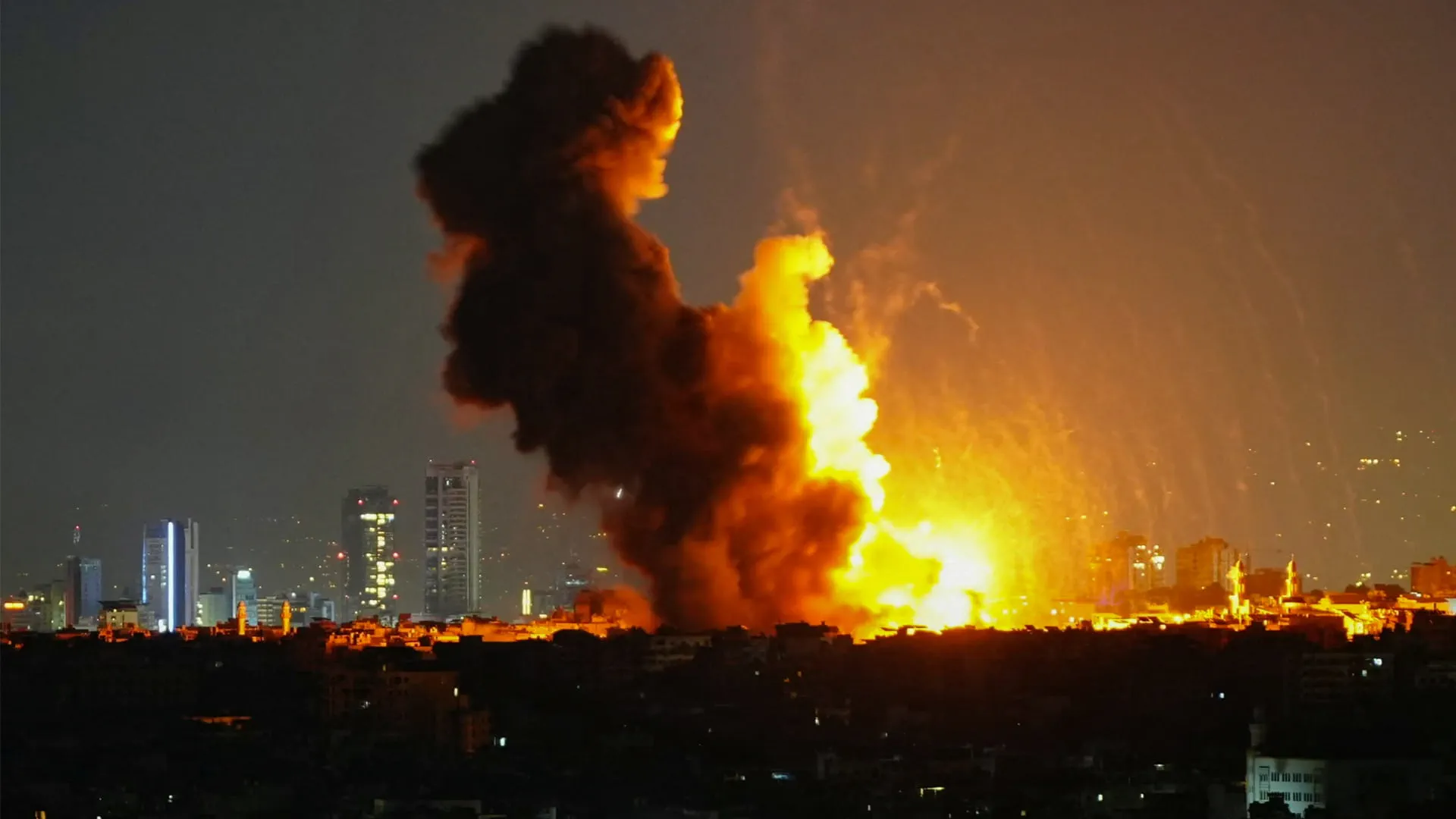 Image for the title: Israel pounds Beirut, levelling residential complex 