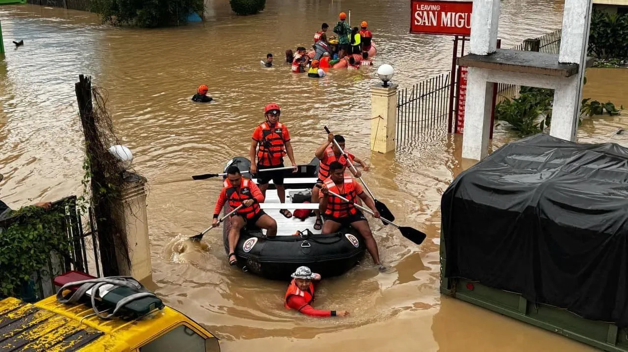 Image for the title: Philippines races to reach stranded as storm's death toll rises 