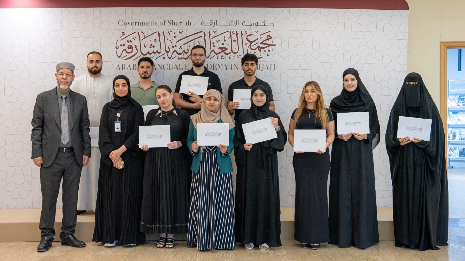 Image for the title: Arabic Language Academy honours 12 students from 7 countries 