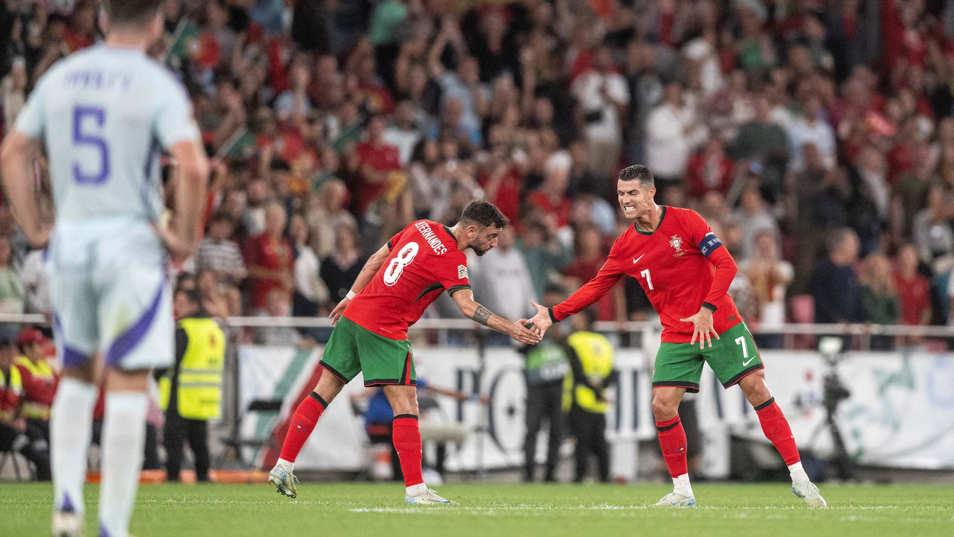 Image for the title: Ronaldo strikes late to seal Portugal win over Scotland 