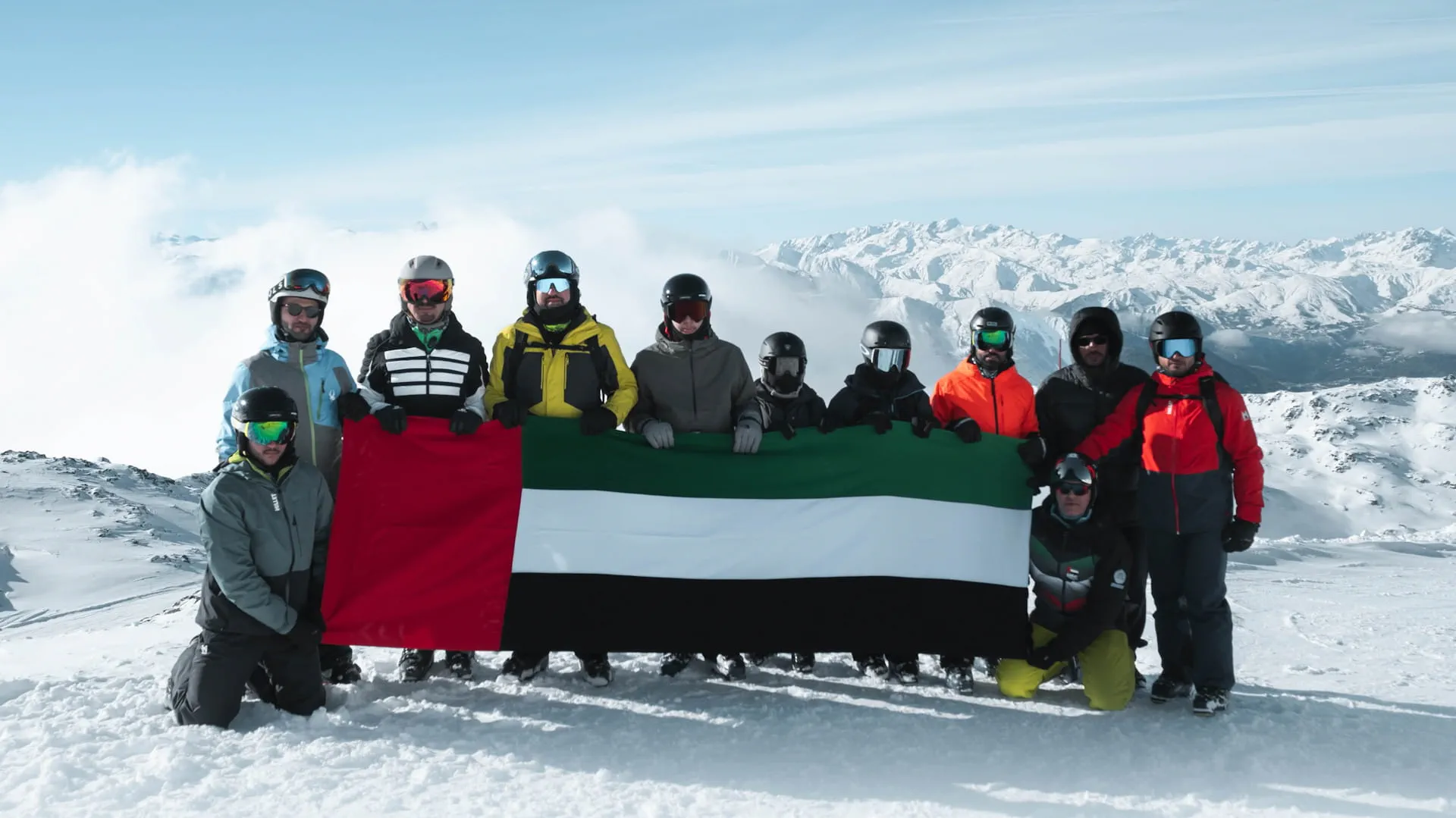 UAE flag and Zayed, Rashid portraits raised atop Alps
