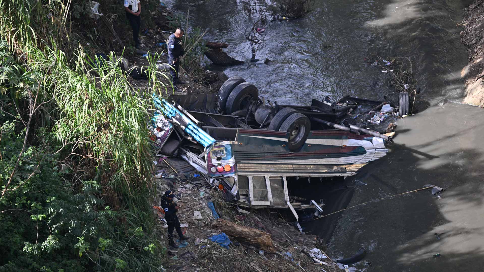 At least 55 dead after Guatemala bus plunges into ravine 