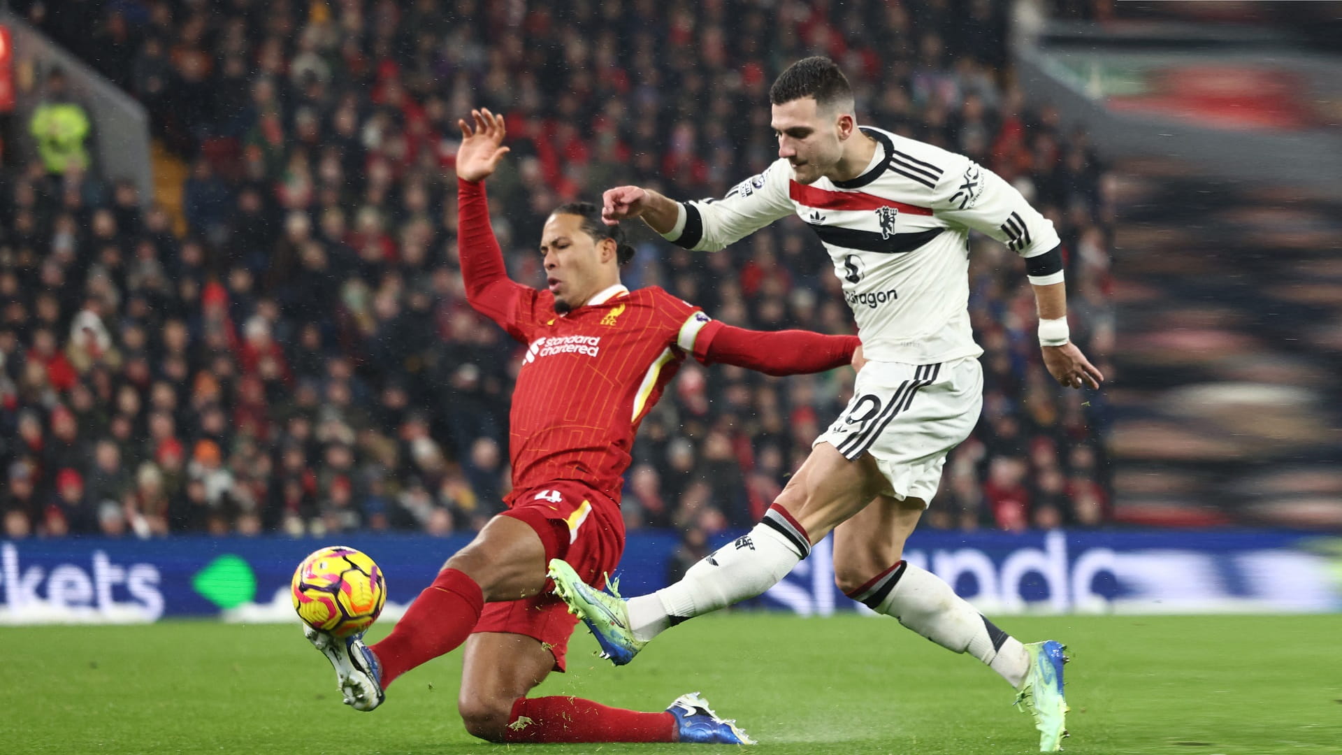 Man Utd rally to slow Liverpool charge towards league title 