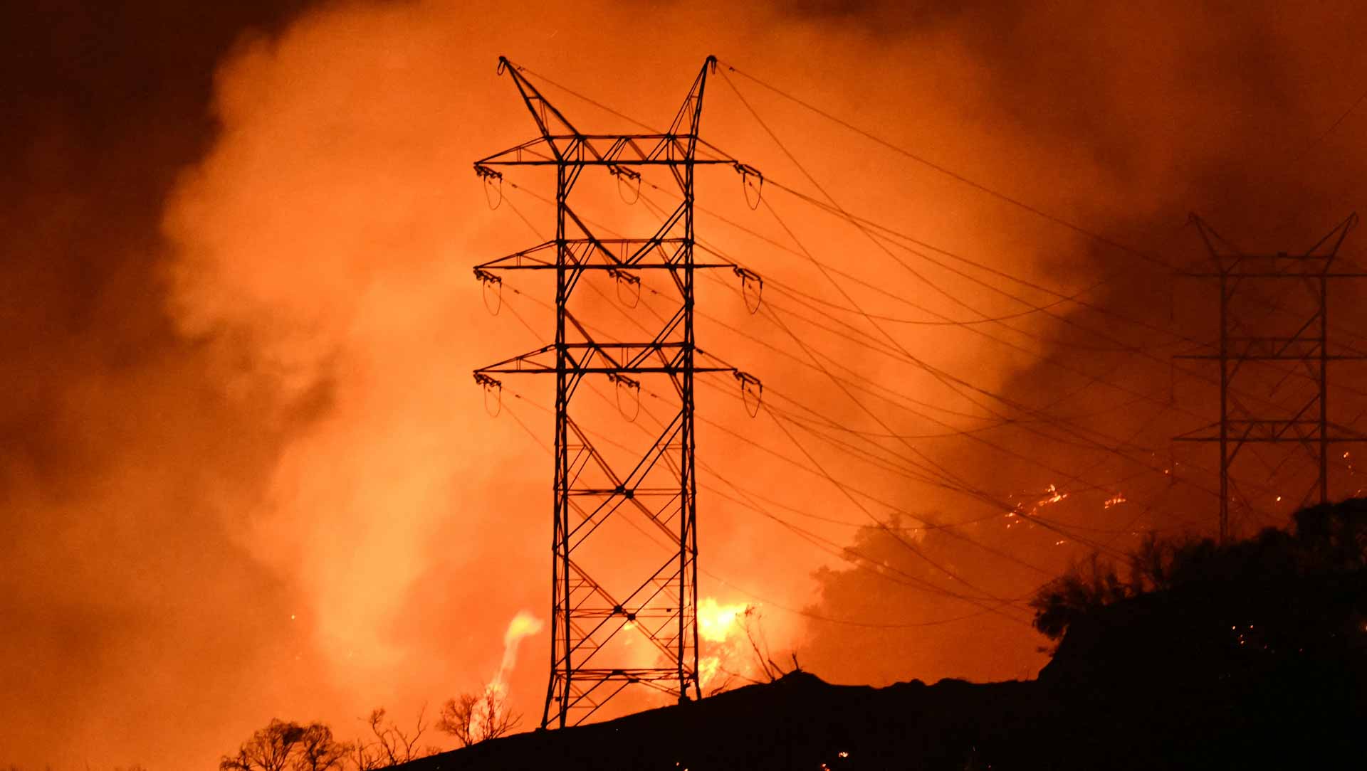 Firefighters scramble to put out LA fires as winds increase 