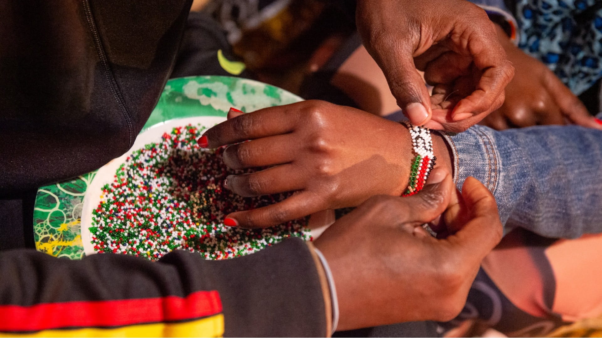Kenyan artist displays bracelet-making skills at SFAL 