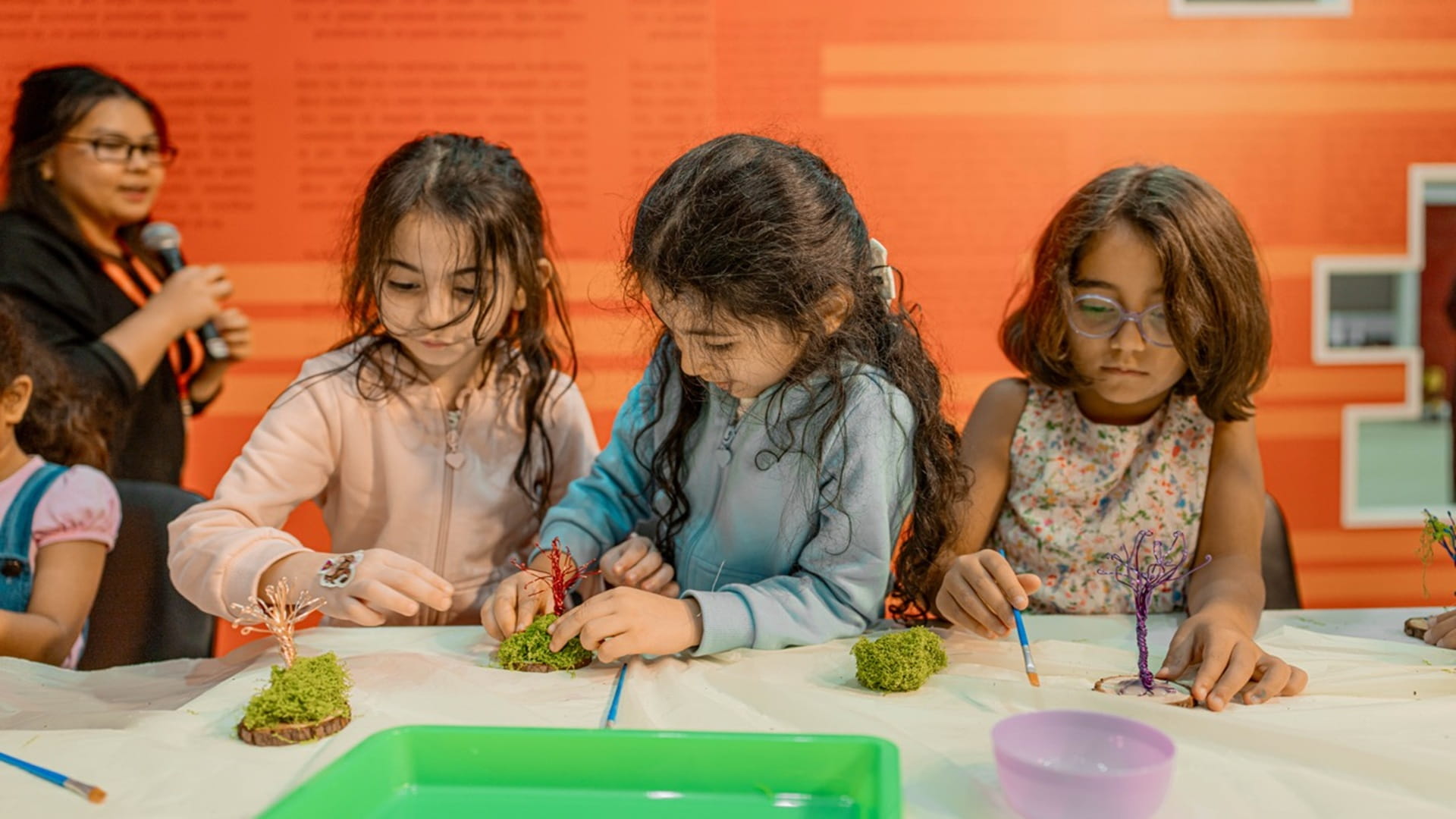 Children participates in “Bonsai Tree” workshop at SIBF 
