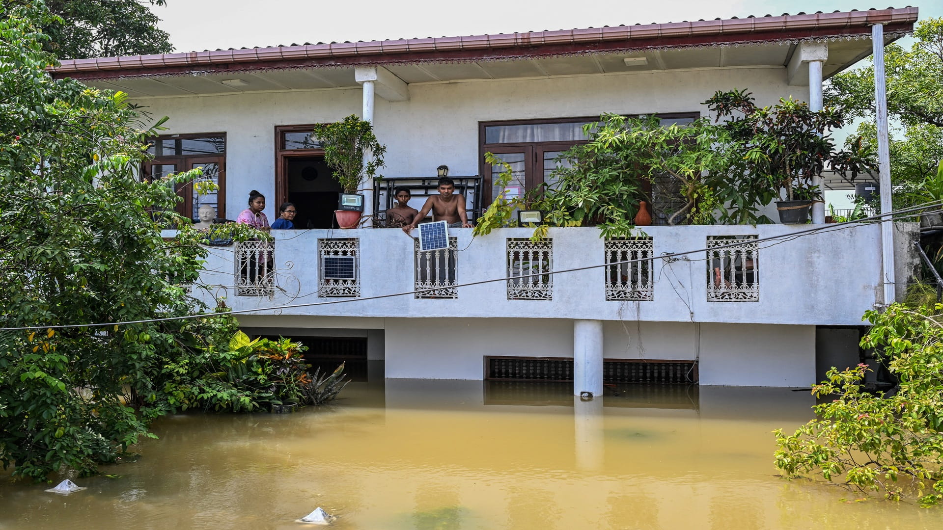 Race to deliver aid as Asia flood death toll approaches 1200 