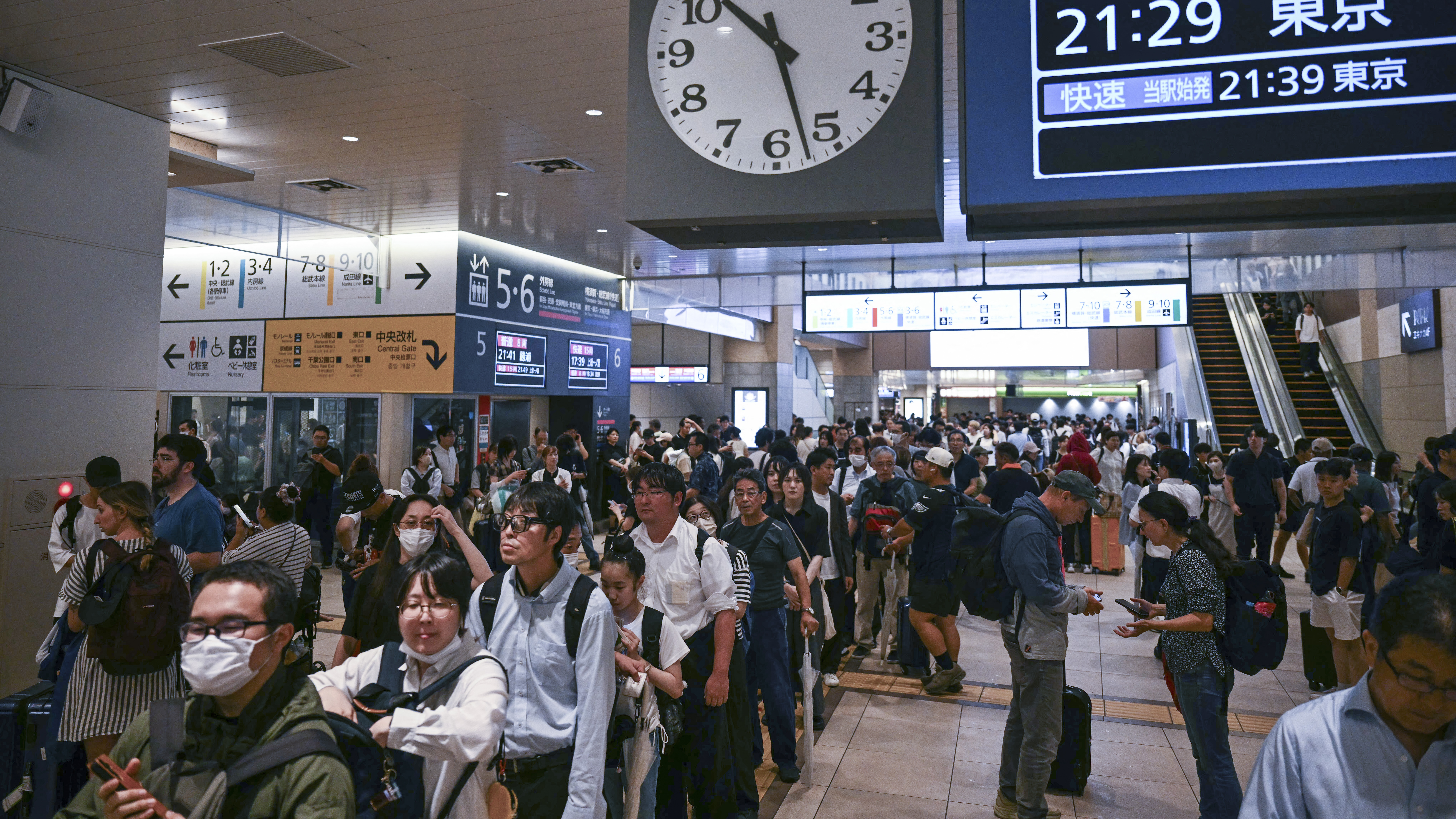 Image for the title: Record rainfall kills eight, strands thousands in Japan 