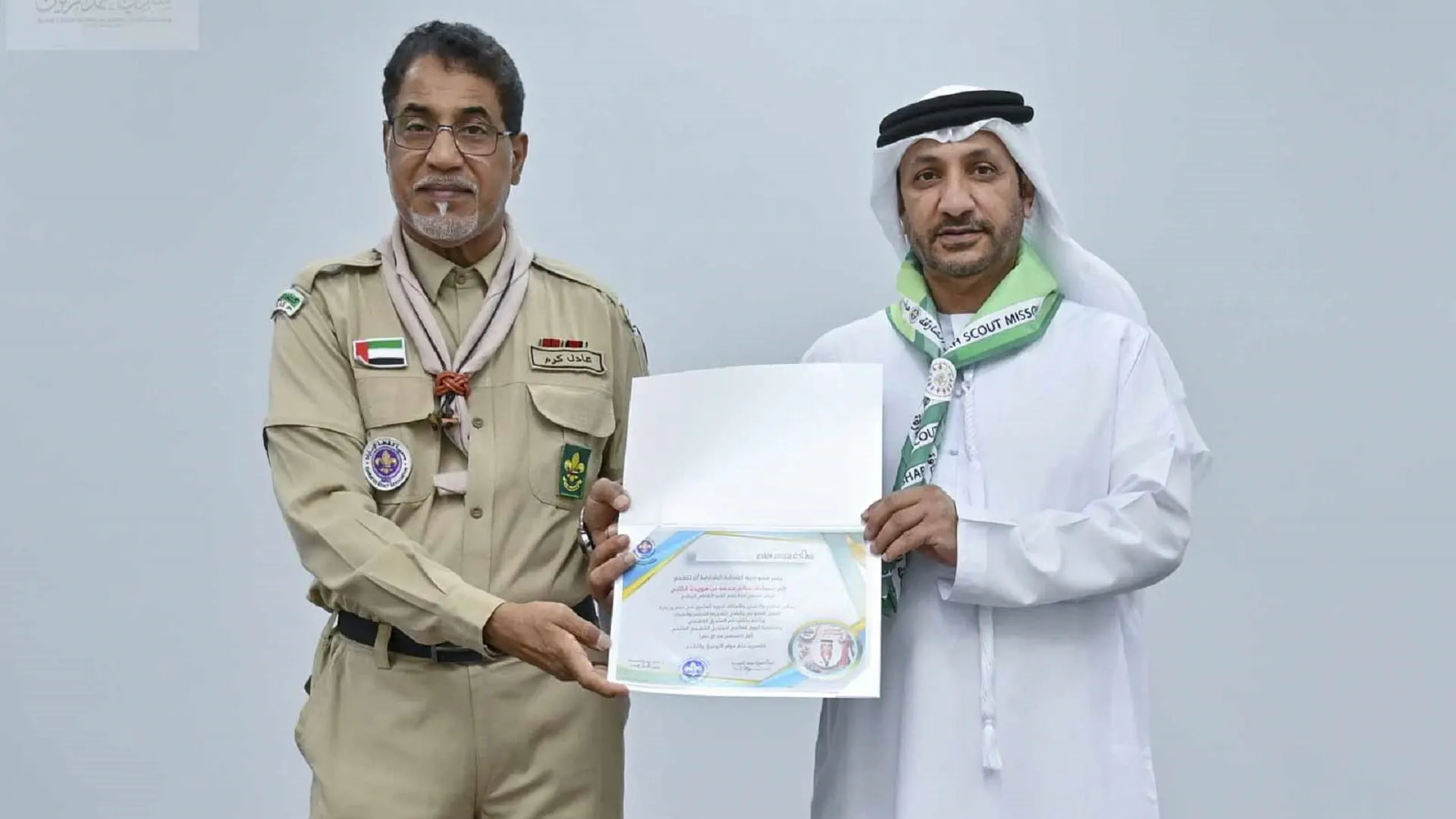 Salim Bin Huwaiden honoured with scout neckerchief and shield