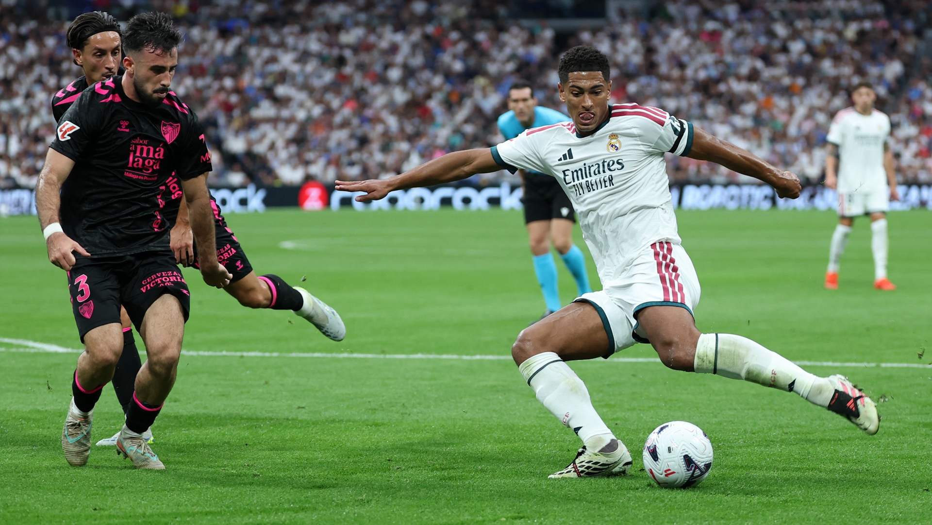 Image for the title: Real Madrid cruise past Malaga 4-0 to stay perfect 