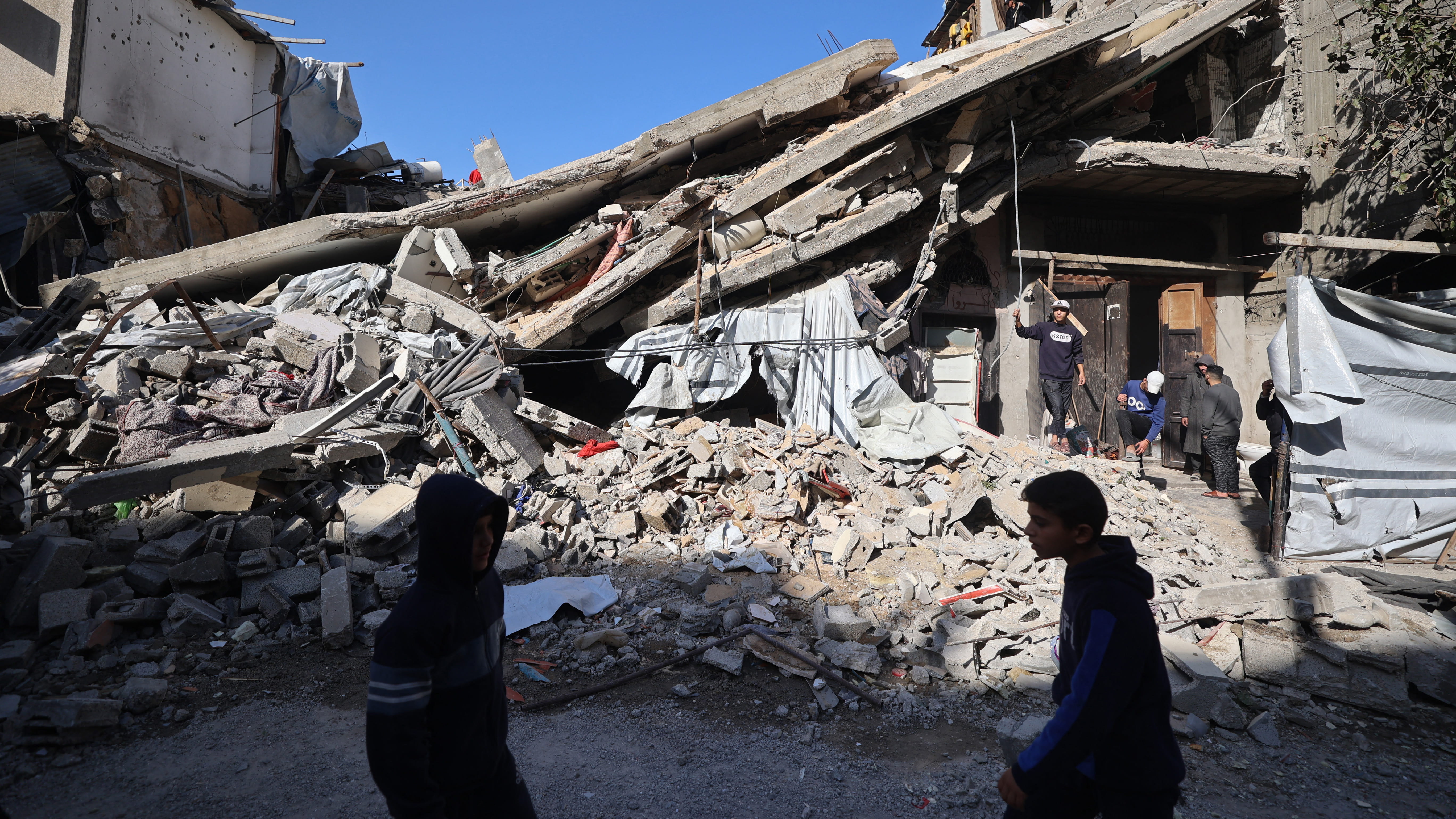 Civil defence says Israeli attacks kill 9 including 5 children