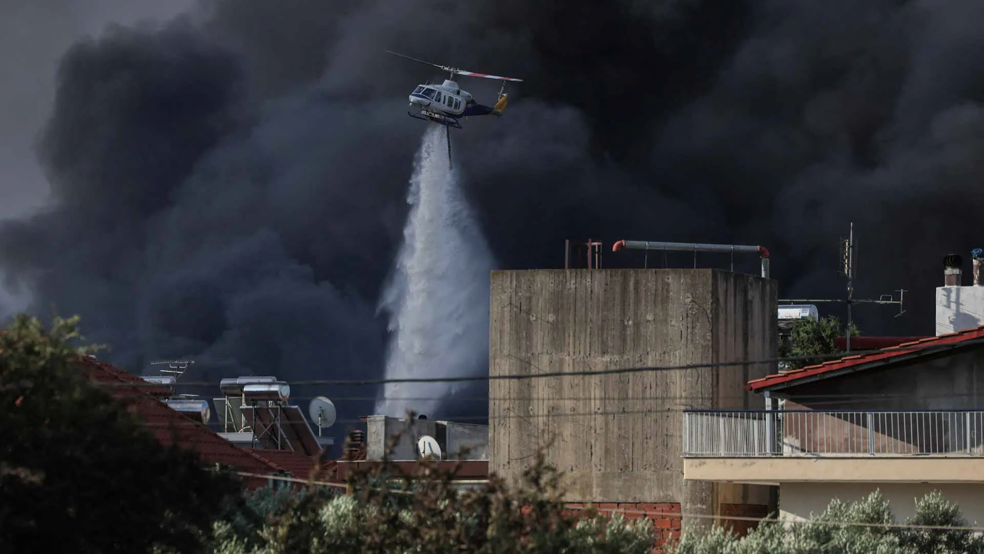 Hundreds of firefighters battle wildfires across Portugal, Greece