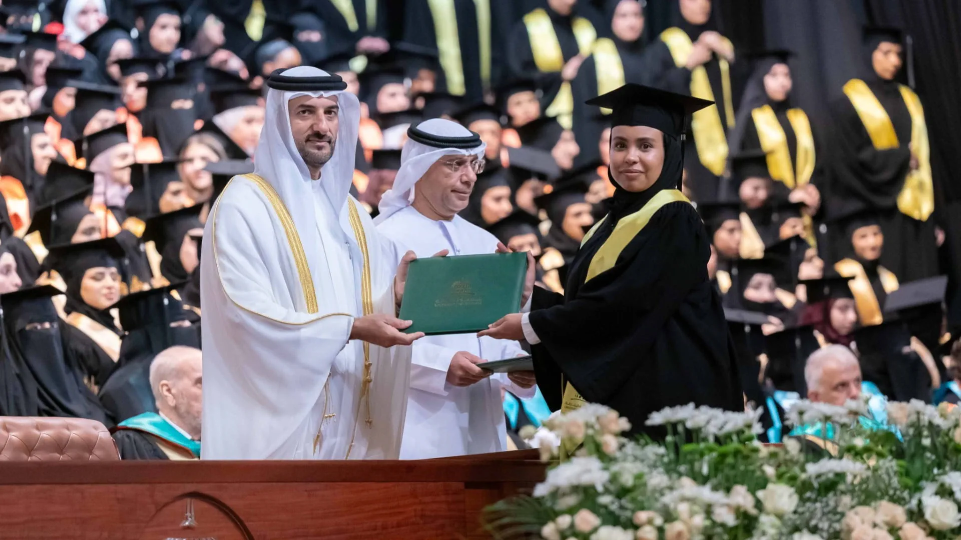 His Highness handing certificates