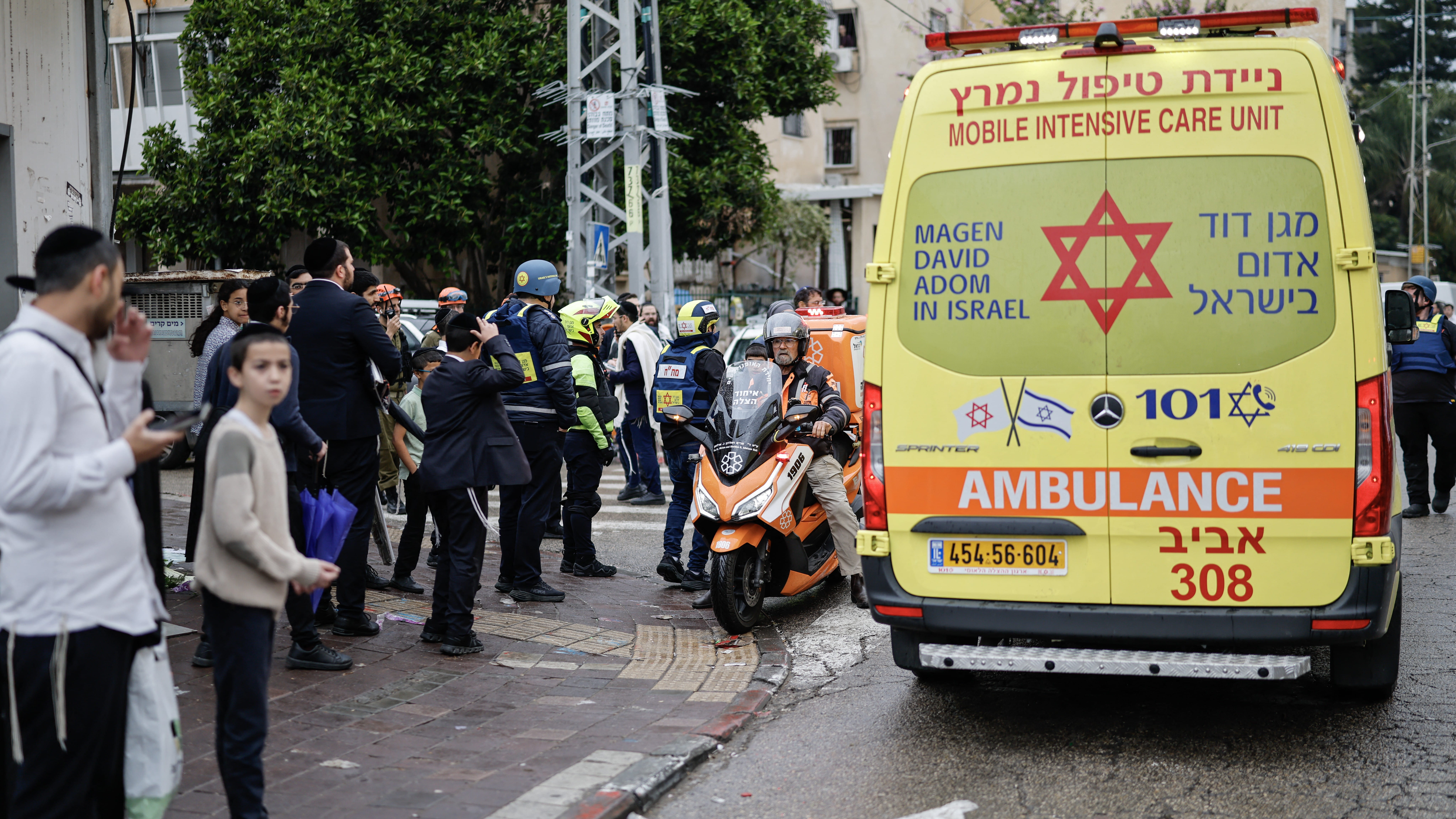 Image for the title: Israel medics say 14 wounded after Iranian missile fire 