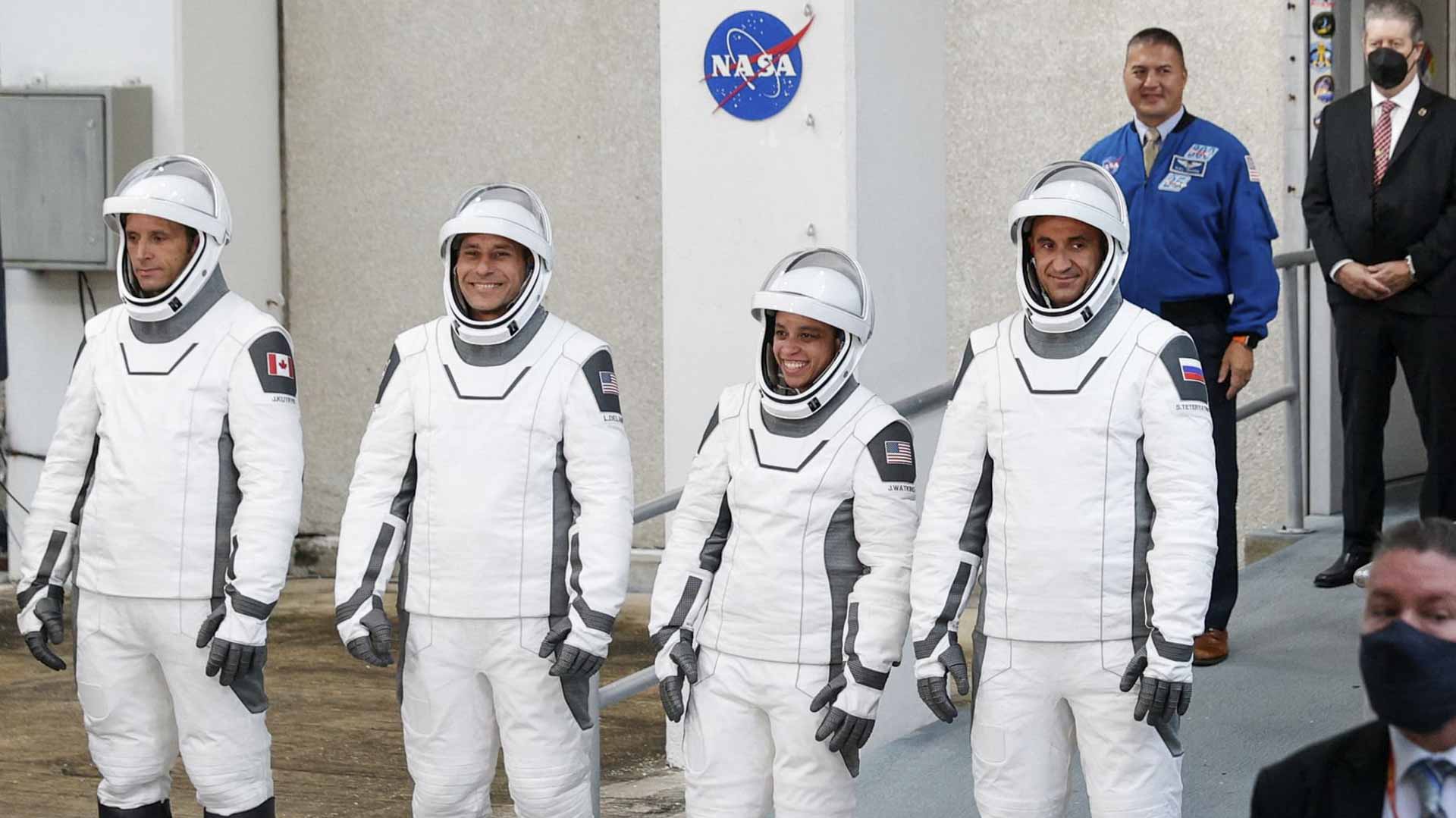 Four astronauts reach Intl Space Station in record time 