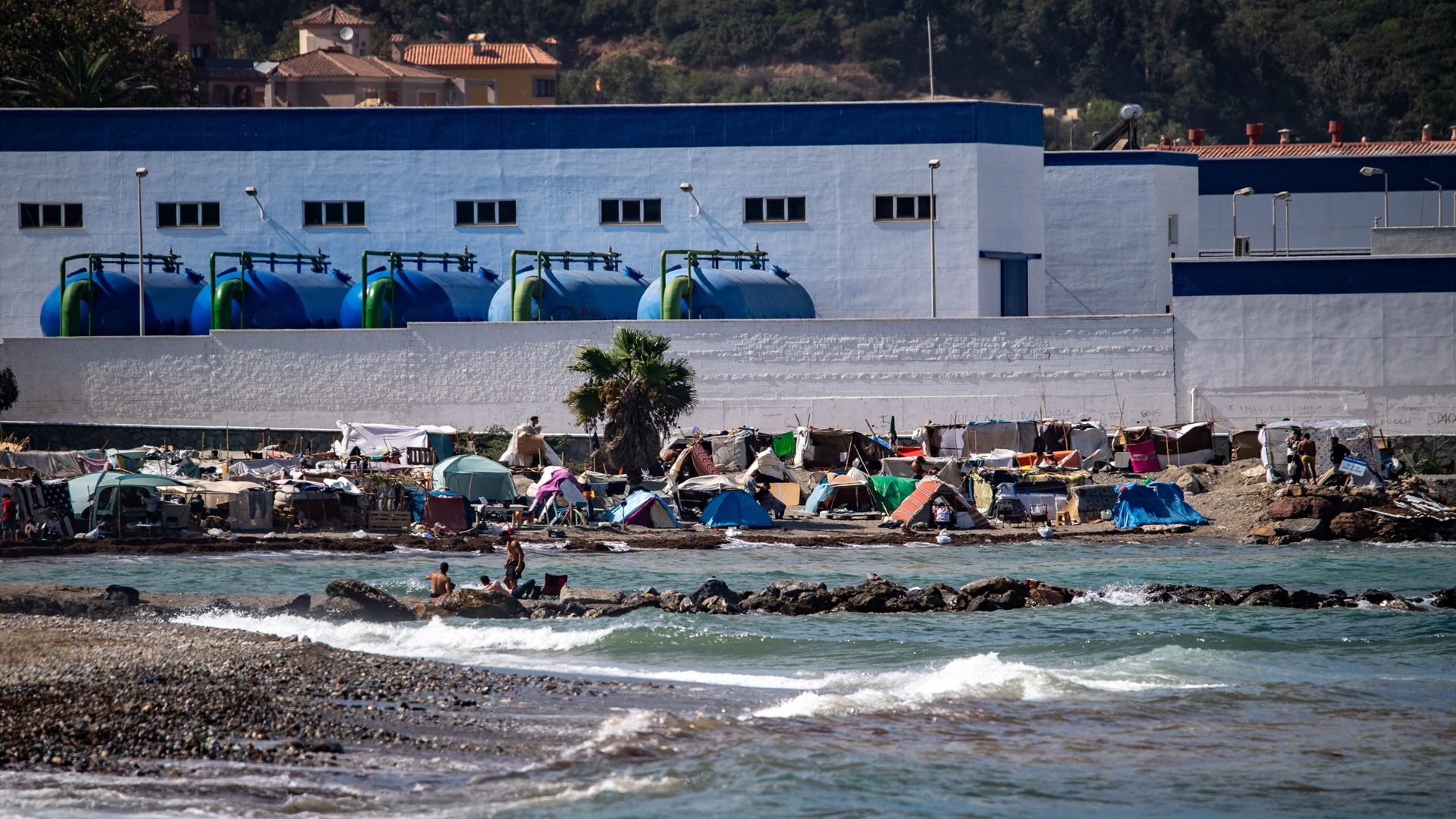 Spain says over 5,300 migrants left Ceuta in month 