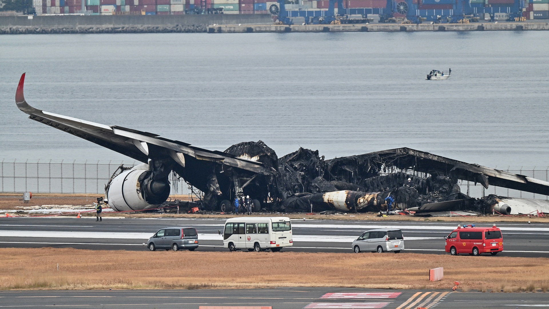 Japan investigators probe conflicting reports on plane crash